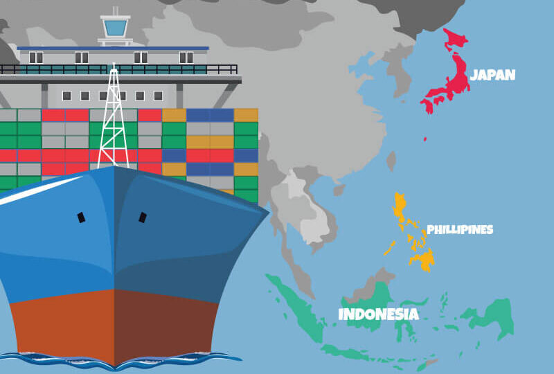 A container ship with a Japan, the Philippines and Indonesia on a map in the background