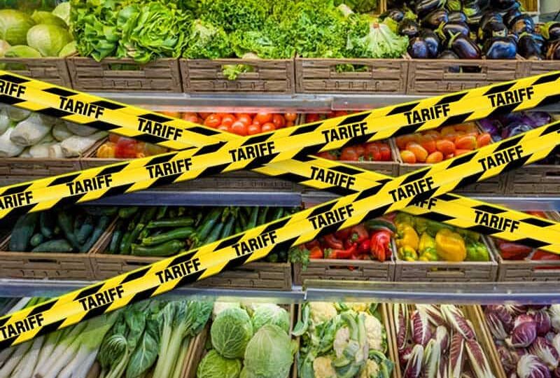 Produce with caution tape that with the word 'tariffs' on it