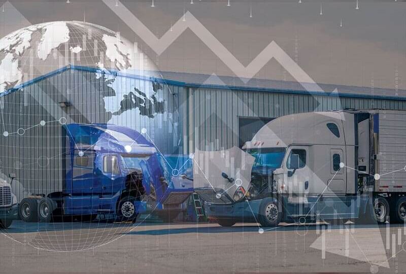 Two semi trucks with the hood open